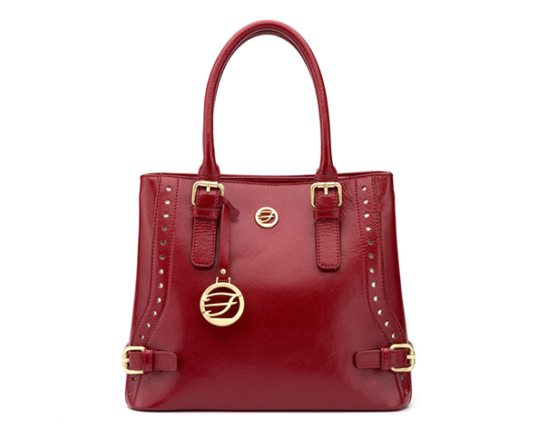Red color leather bag
